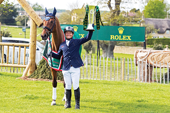 Michael Jung of Germany and La Biosthetique - Sam FBW with the Rolex Grand Slam Trophey